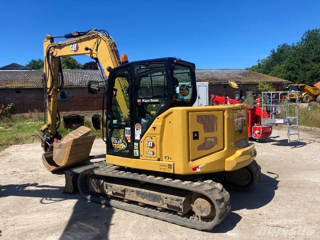 CAT 308 Малые экскаваторы 7т-12т