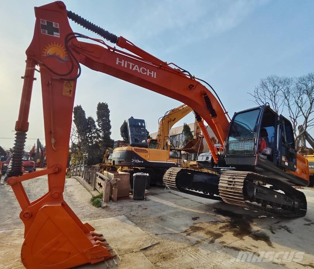 Hitachi ZX 210 Гусеничные экскаваторы