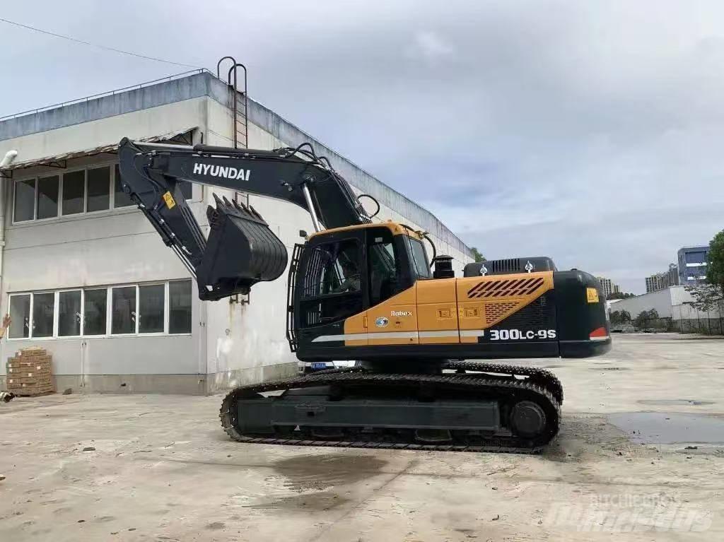 Hyundai 300-9 Гусеничные экскаваторы