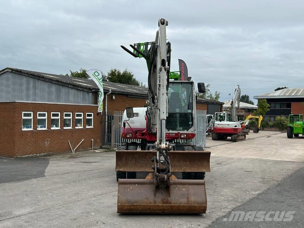 Takeuchi TB 295 W Колёсные экскаваторы