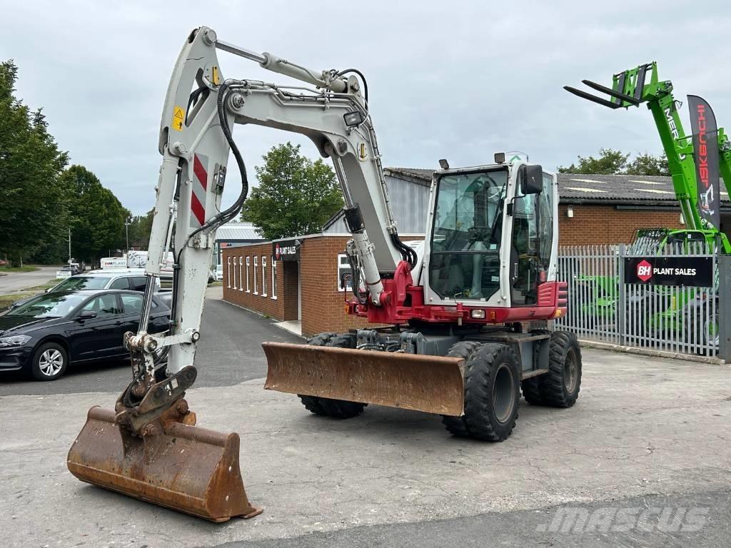 Takeuchi TB 295 W Колёсные экскаваторы