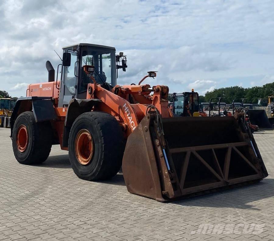 Hitachi LX 210 E Фронтальные погрузчики