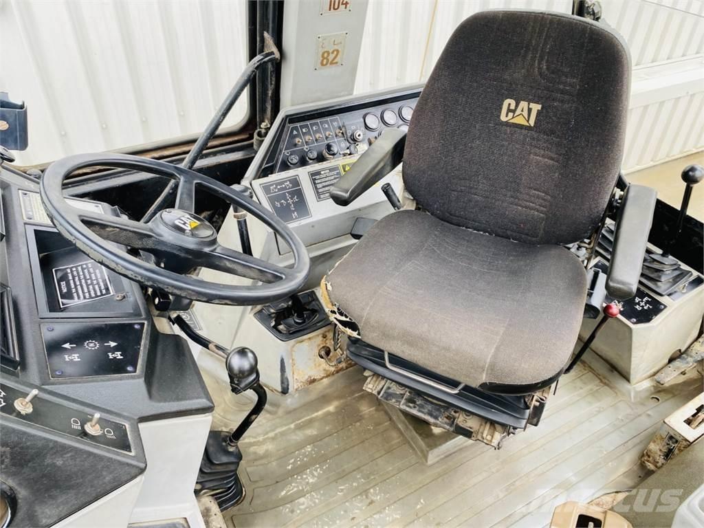 CAT 428B Строительная техника - Другие