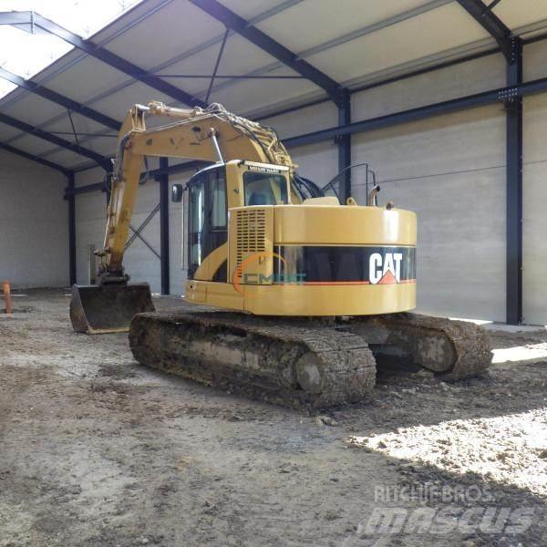 CAT 321C LCR Колёсные экскаваторы