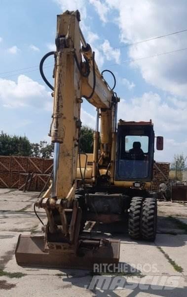 Komatsu PW 170 Колёсные экскаваторы