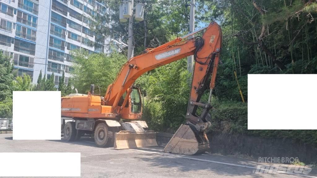 Doosan DX 210 W Колёсные экскаваторы