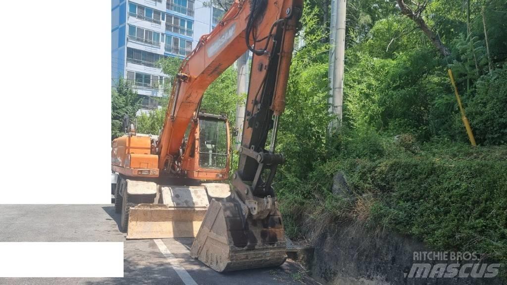 Doosan DX 210 W Колёсные экскаваторы
