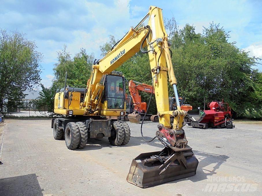 Komatsu PW 140-7 Колёсные экскаваторы