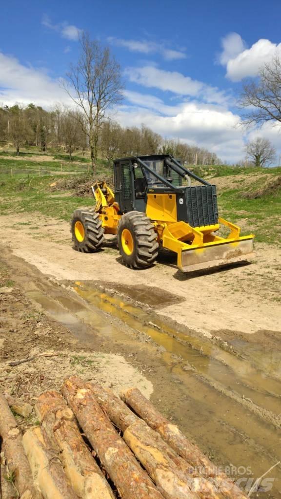 John Deere 640 Трелевочные трактора