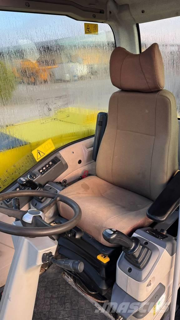 New Holland MH 2.6 Колёсные экскаваторы