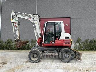 Takeuchi TB295W Колёсные экскаваторы