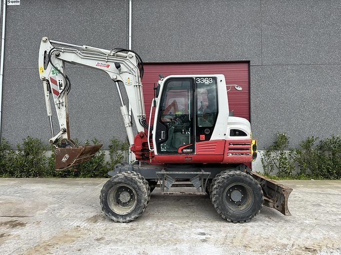 Takeuchi TB295W Колёсные экскаваторы