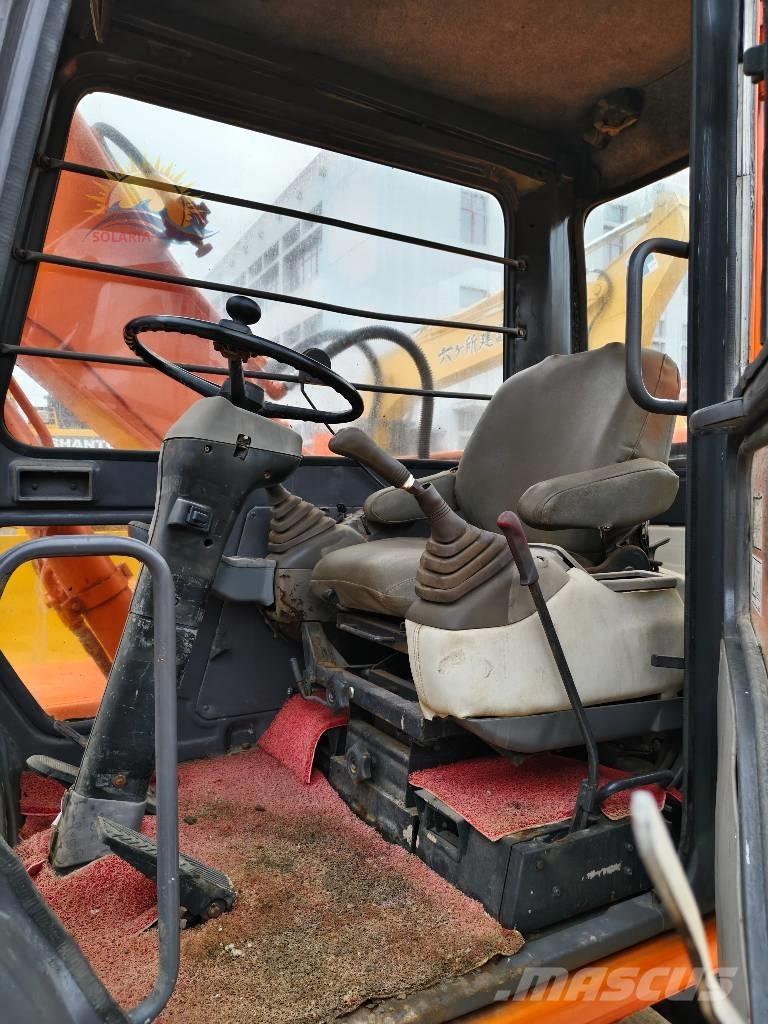 Hitachi EX 100 W D Колёсные экскаваторы