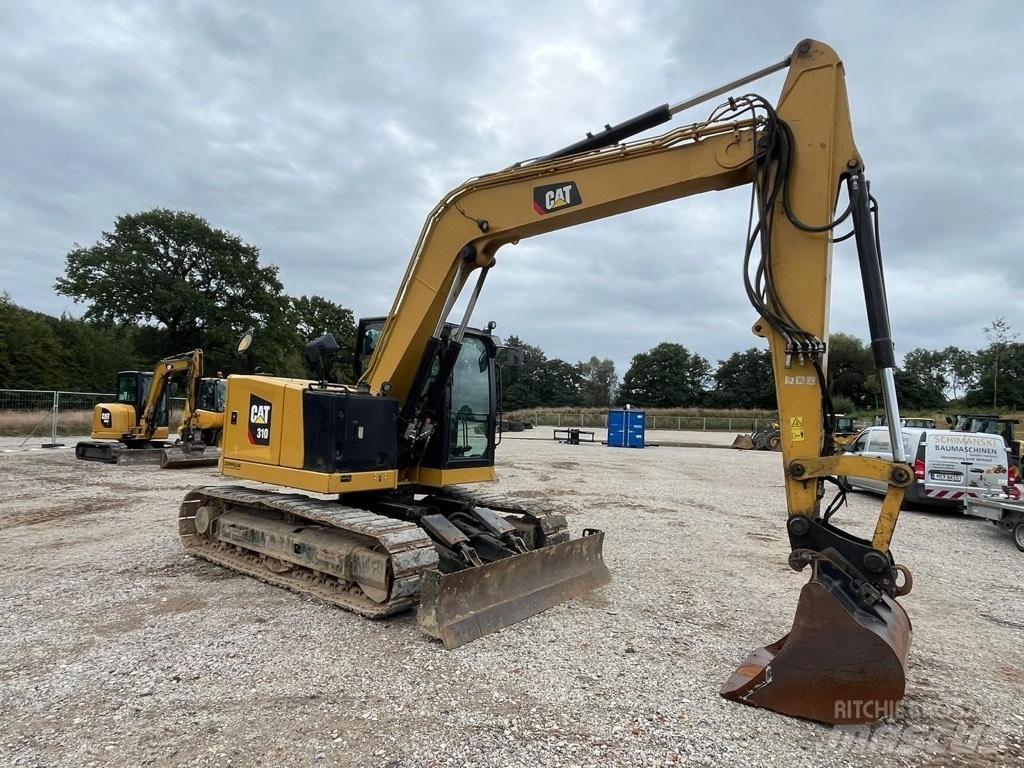 CAT 310 Малые экскаваторы 7т-12т