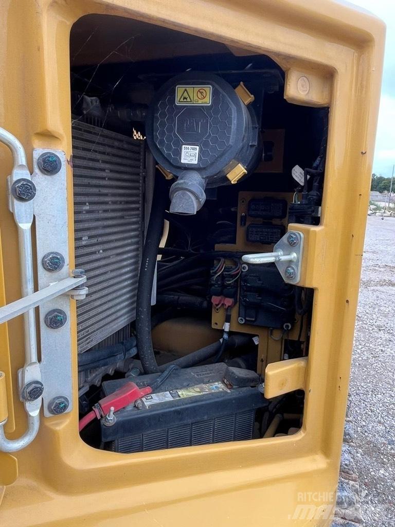 CAT 310 Малые экскаваторы 7т-12т
