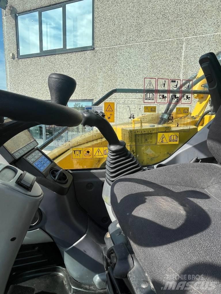 Komatsu PW98MR-10 Колёсные экскаваторы