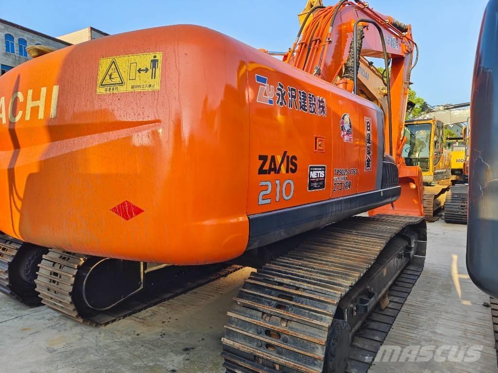 Hitachi ZX 210 Гусеничные экскаваторы