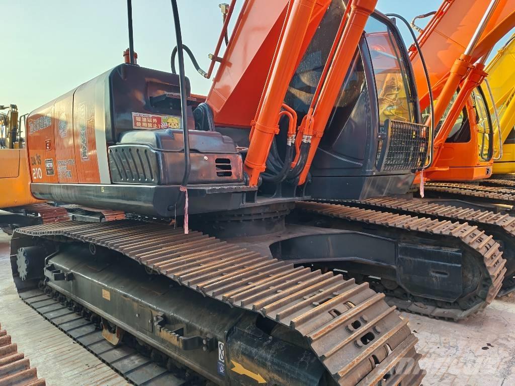 Hitachi ZX 210 Гусеничные экскаваторы