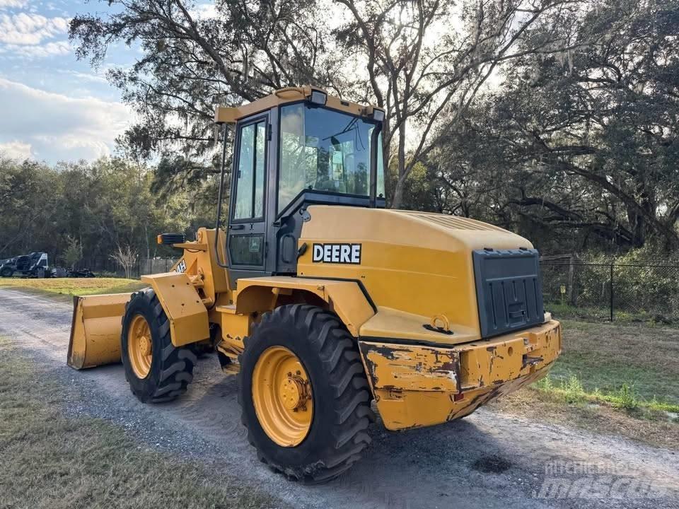 John Deere 324h Фронтальные погрузчики