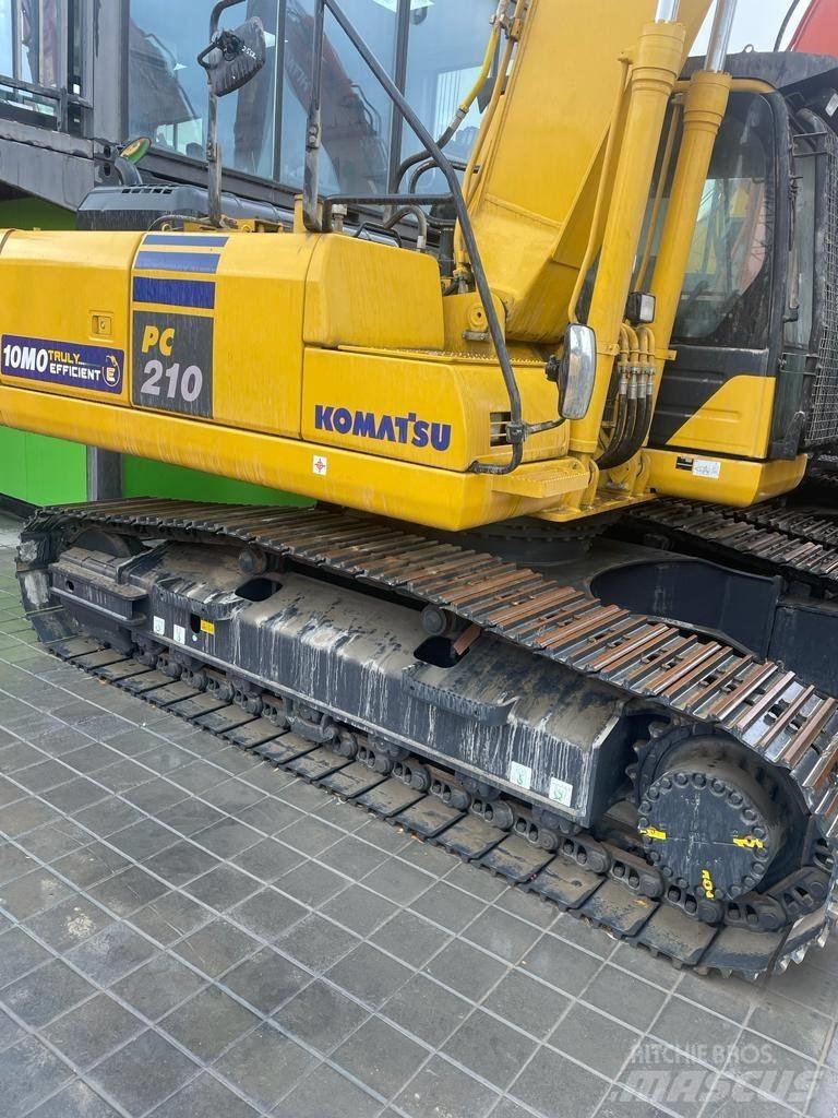 Komatsu PC210-10MO Гусеничные экскаваторы