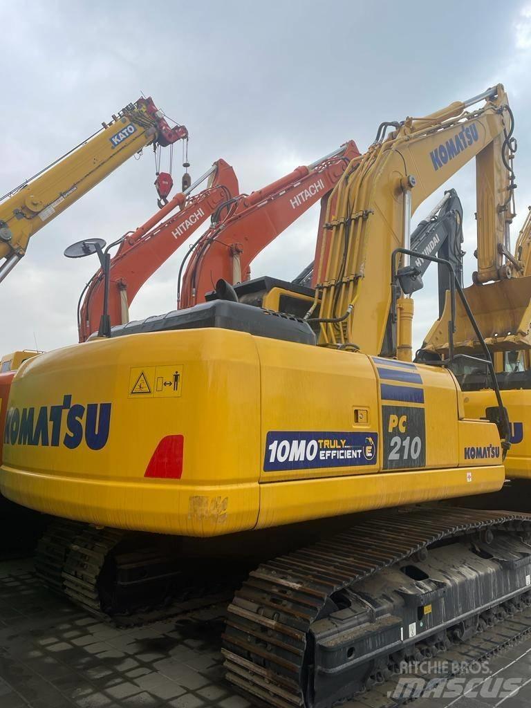Komatsu PC210-10MO Гусеничные экскаваторы