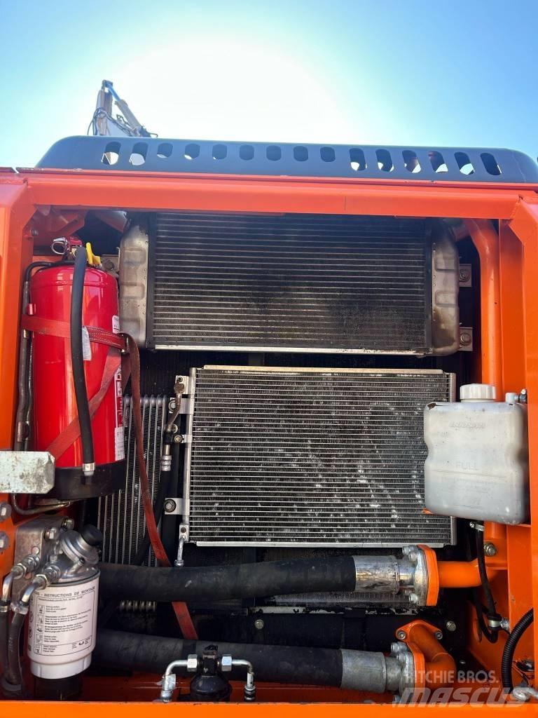 Doosan DX 210 W Колёсные экскаваторы