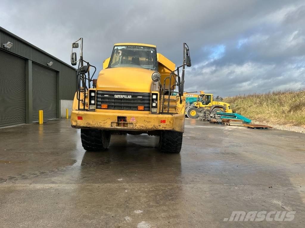 CAT 740C Шарнирно-сочленённые самосвалы