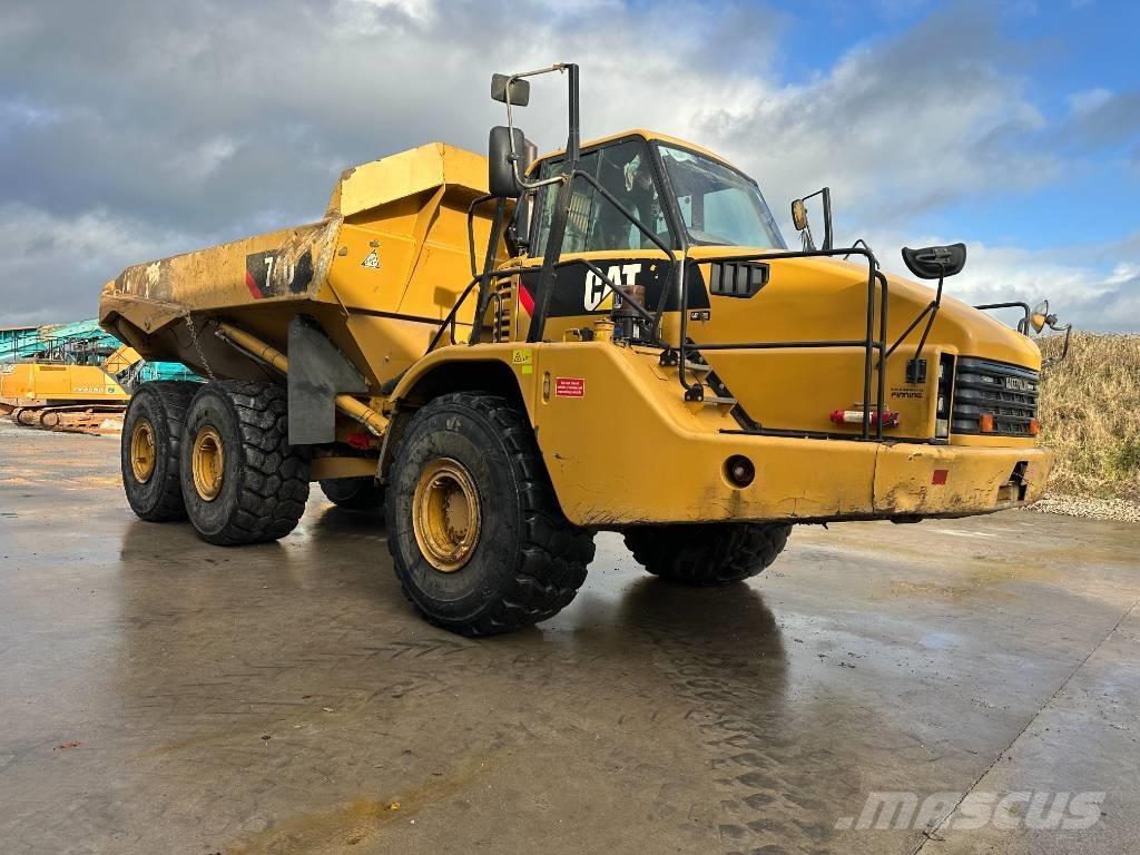 CAT 740C Шарнирно-сочленённые самосвалы