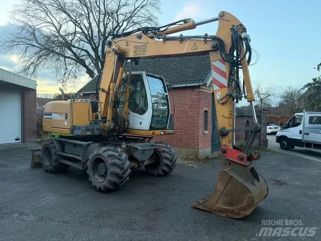 Liebherr A312 Колёсные экскаваторы
