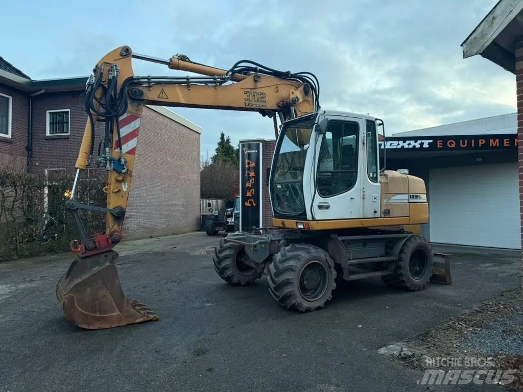 Liebherr A312 Колёсные экскаваторы