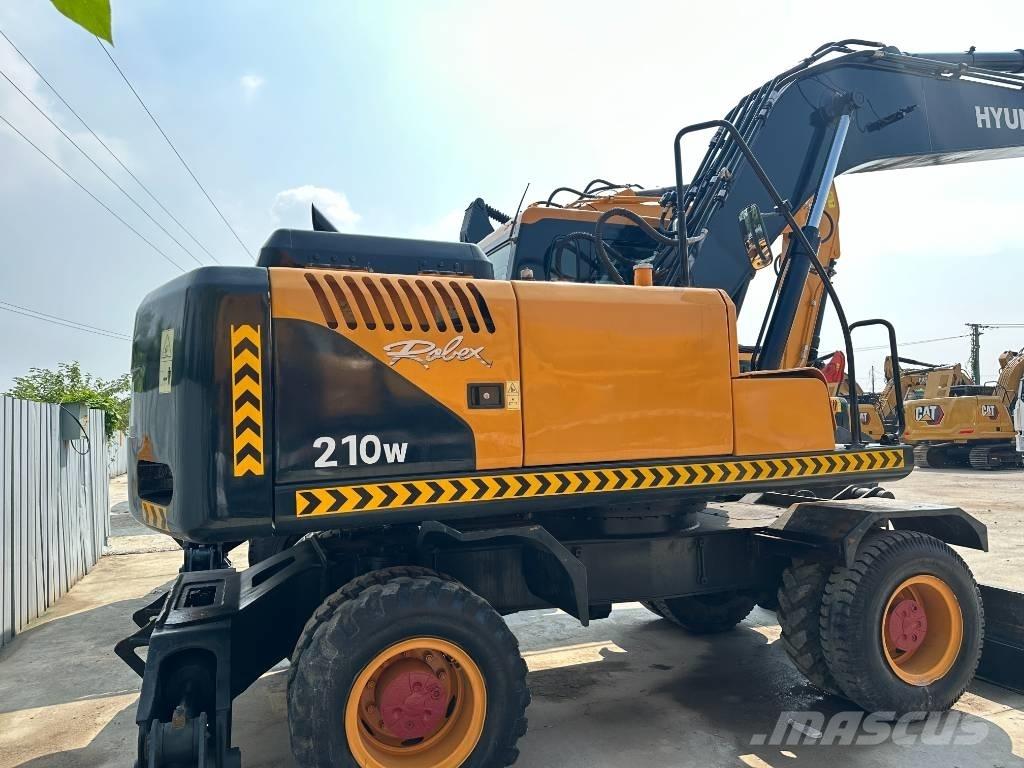 Hyundai 210W-9 Колёсные экскаваторы