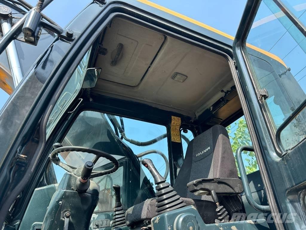 Hyundai 210W-9 Колёсные экскаваторы