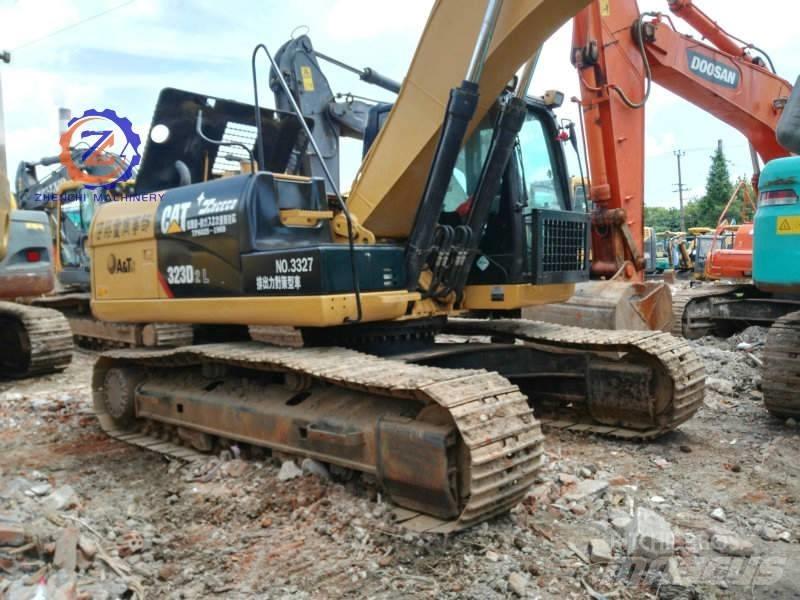 CAT 323 D L Гусеничные экскаваторы