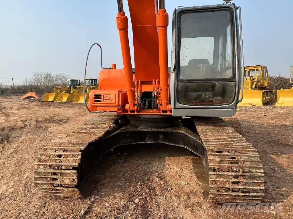 Hitachi EX 200 Гусеничные экскаваторы