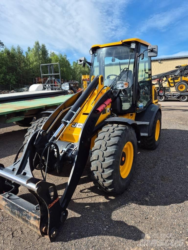 JCB 409 Фронтальные погрузчики