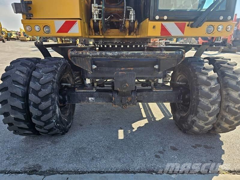 CAT M320F Колёсные экскаваторы
