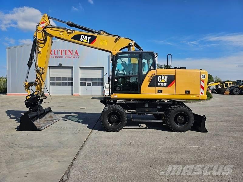 CAT M320F Колёсные экскаваторы