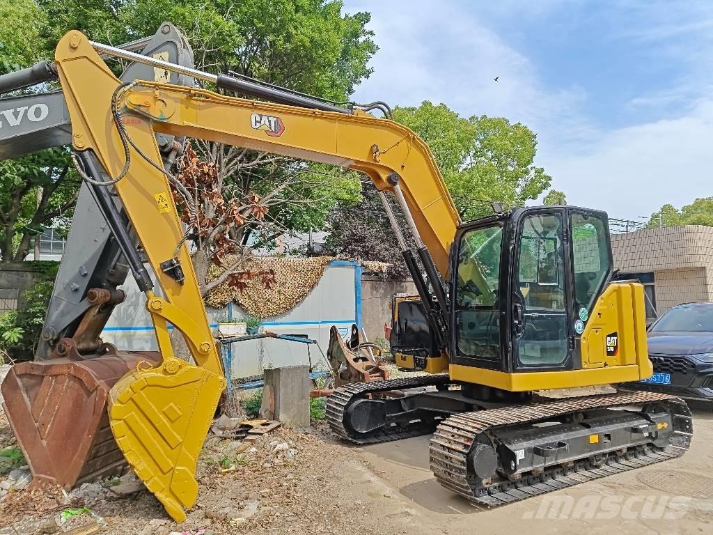 CAT 310 Гусеничные экскаваторы