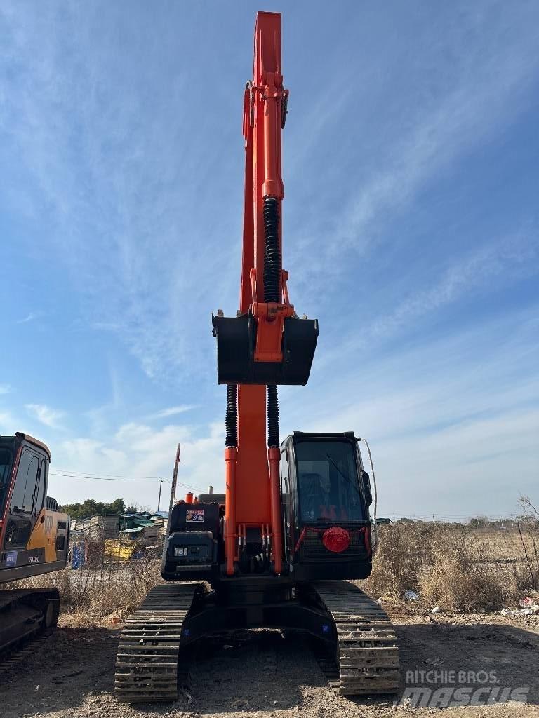 Hitachi ZX 200 Гусеничные экскаваторы