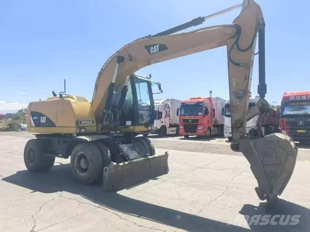 CAT M315D2 Колёсные экскаваторы