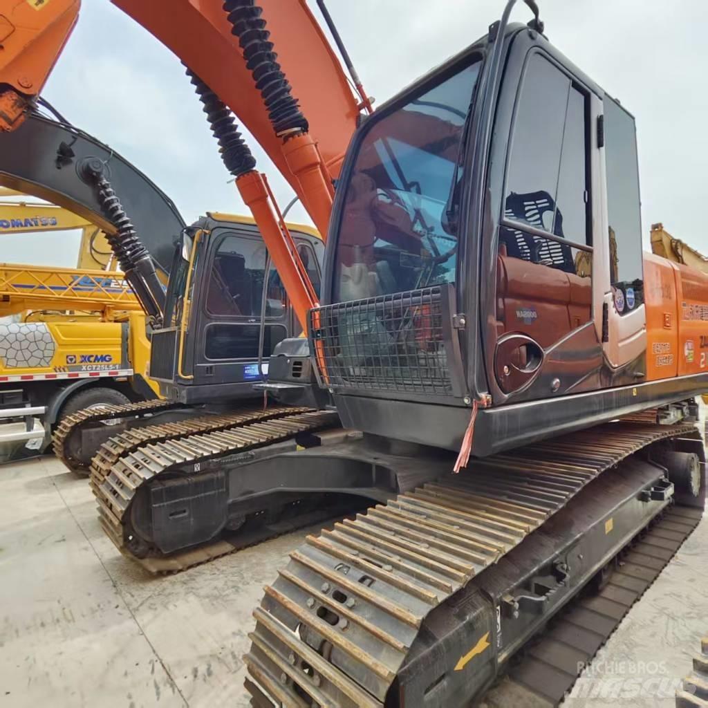 Hitachi ZX 210 Гусеничные экскаваторы