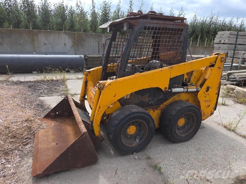 Komatsu SK 714 Мини-погрузчики