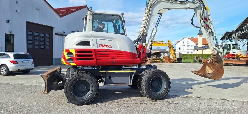 Takeuchi TB 295W Колёсные экскаваторы