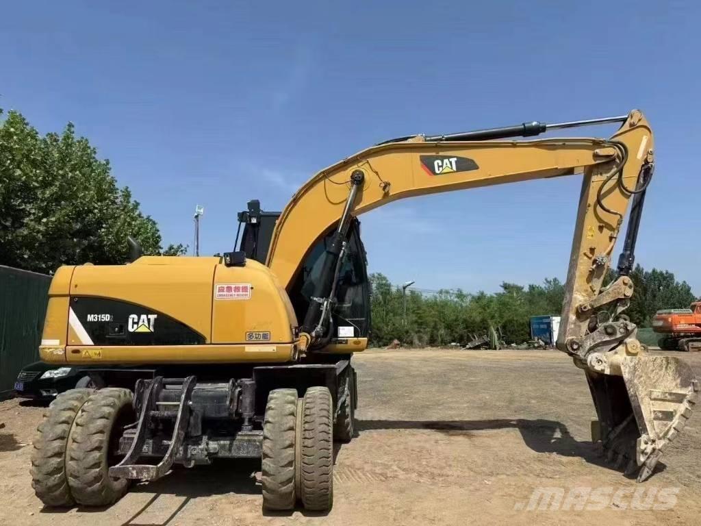 CAT M 315 D Колёсные экскаваторы