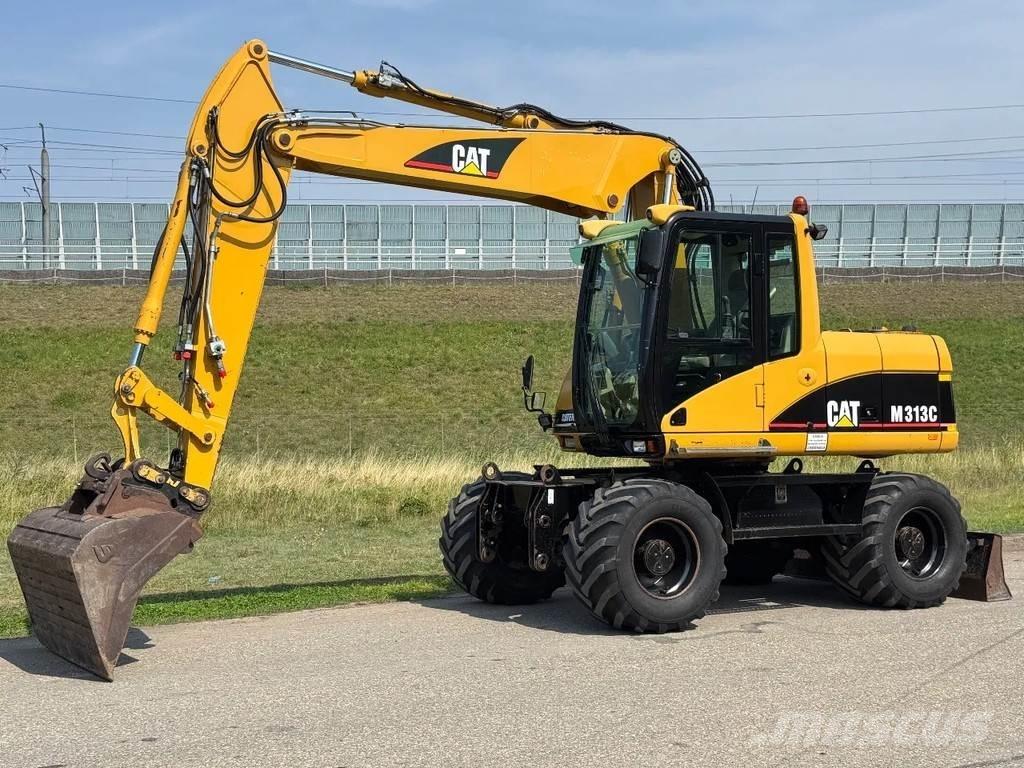 CAT M313C Колёсные экскаваторы