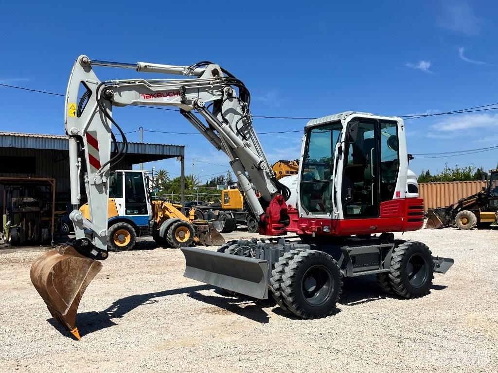 Takeuchi TB 295 Колёсные экскаваторы