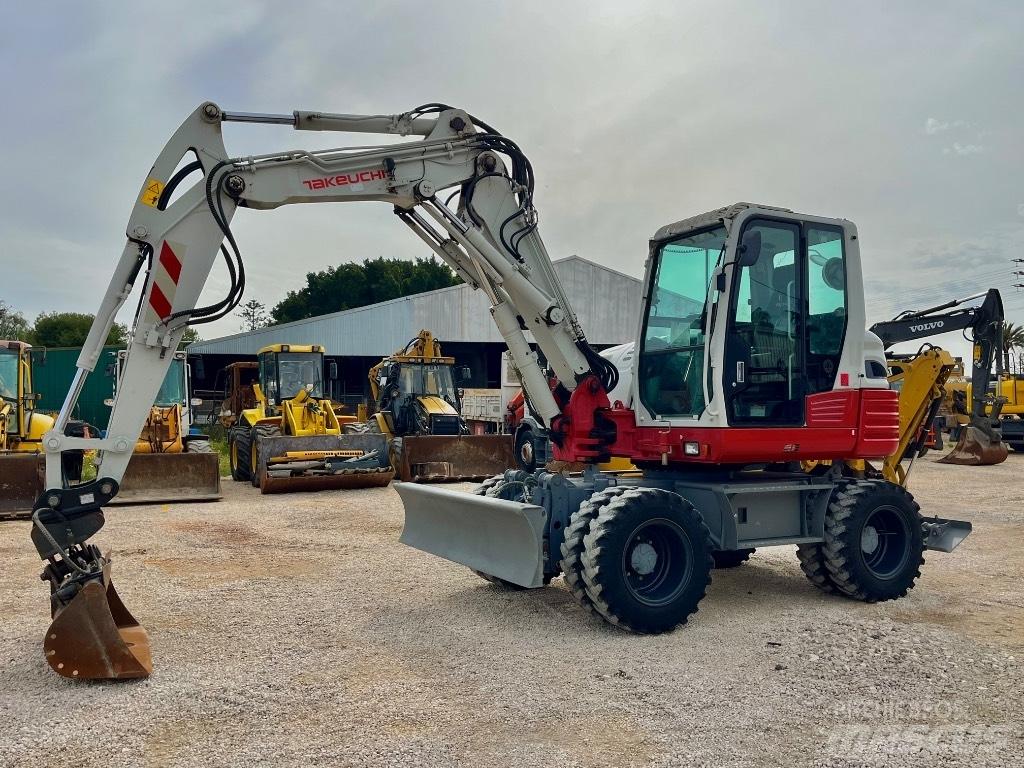 Takeuchi TB 295 Колёсные экскаваторы