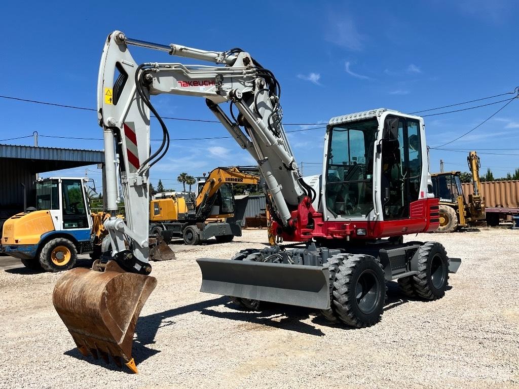 Takeuchi TB 295 Колёсные экскаваторы