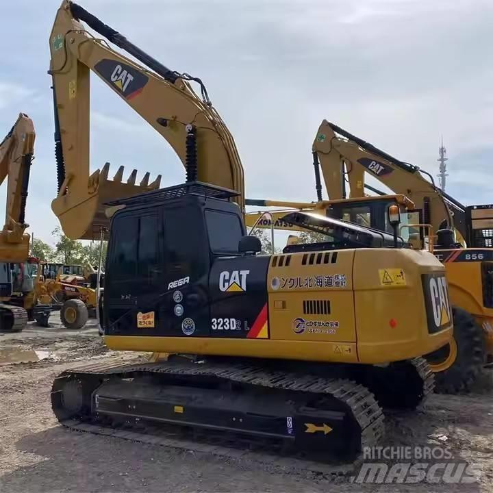 CAT 323 D2L Гусеничные экскаваторы