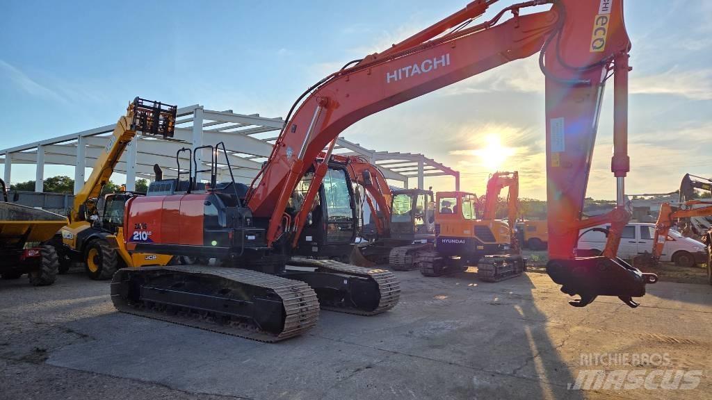 Hitachi ZX 210 Гусеничные экскаваторы
